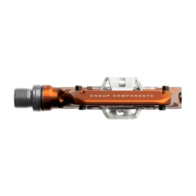 Pedal OneUp Clip naranja para MTB, plataforma amplia, ajuste de tensión y compatible con SPD