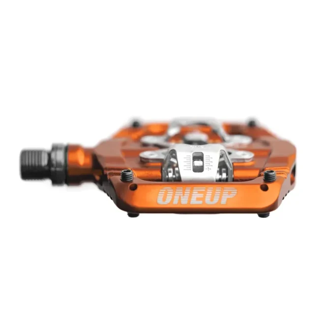 Pedal OneUp Clip naranja para MTB, plataforma amplia, ajuste de tensión y compatible con SPD